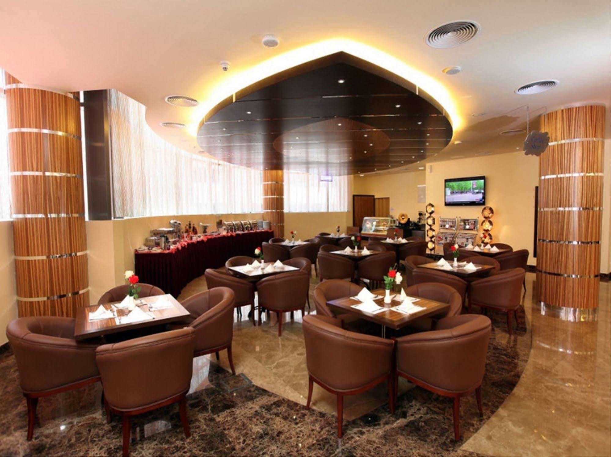 Xclusive Maples Hotel Apartment Dubai Restaurante foto